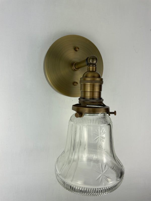 Pair of 1920's 4 1/2" Clear Glass with raised star motif Sconces with Antique Brass Hardware
